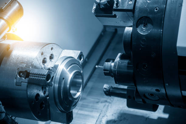 The  multi-tasking CNC lathe machine making the metal shaft parts by milling turret. The hi-technology metal working processing by CNC turning machine .