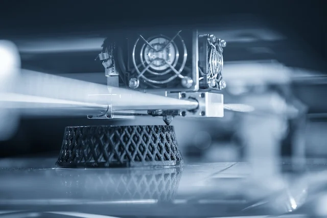 3D printing process creating aerospace component with precision additive manufacturing.