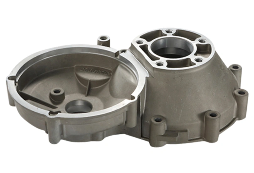 Cast aluminum gearbox housing with precision-machined bolt patterns and internal cooling fins