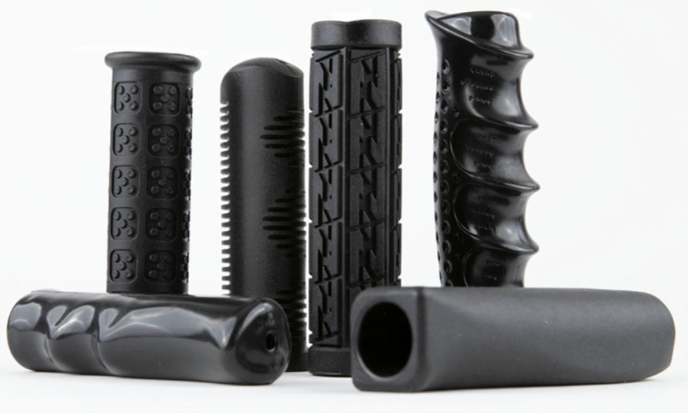 A close-up image of different designs of black bike handlebars made by plastic injection molding 