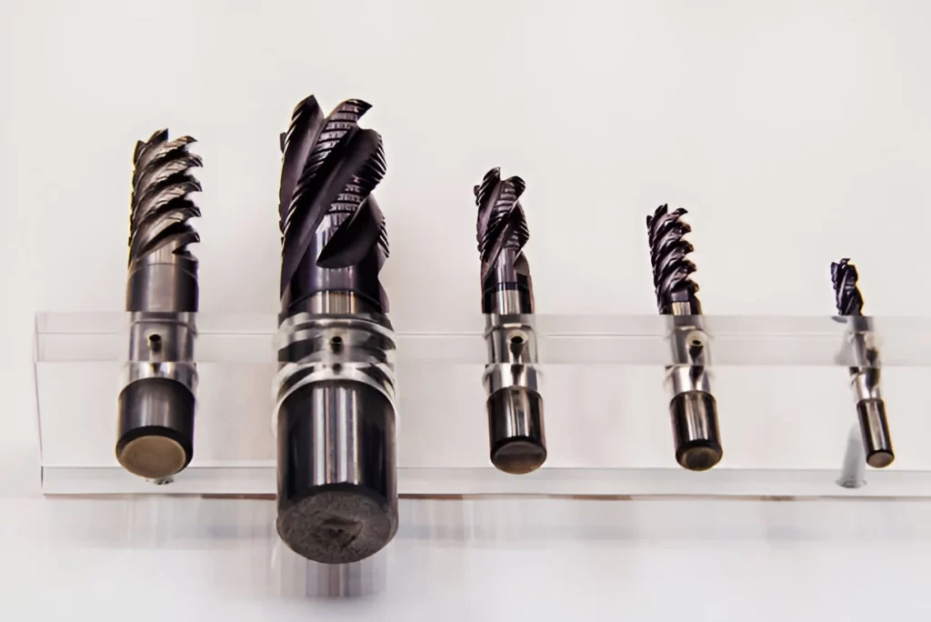 The Carbide End Mills are arranged neatly in tool holders.