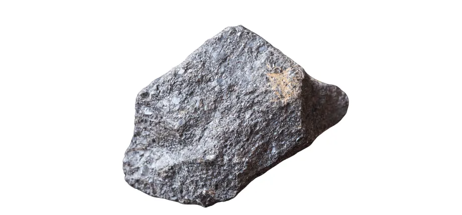 Raw chromium rock ore on a white background