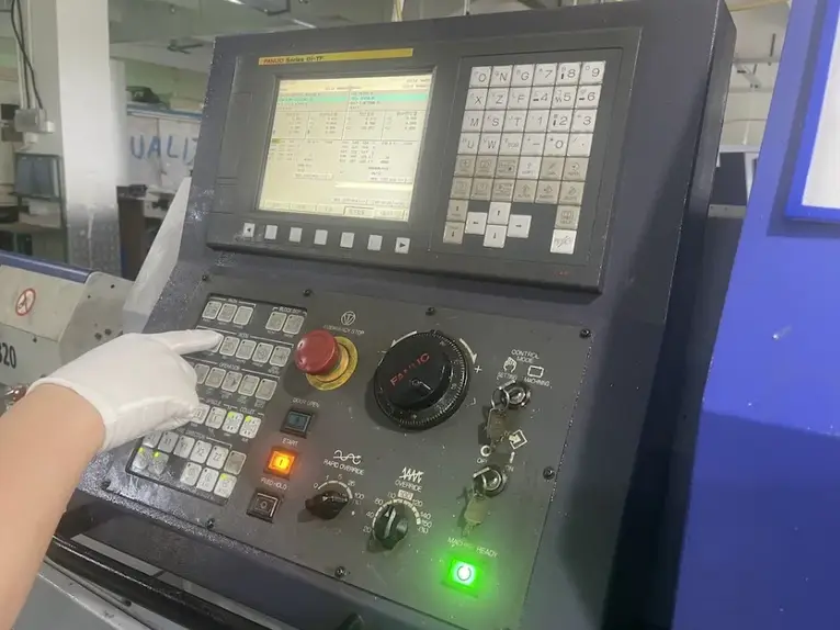 CNC machine control panel with operator programming interface and display screen
