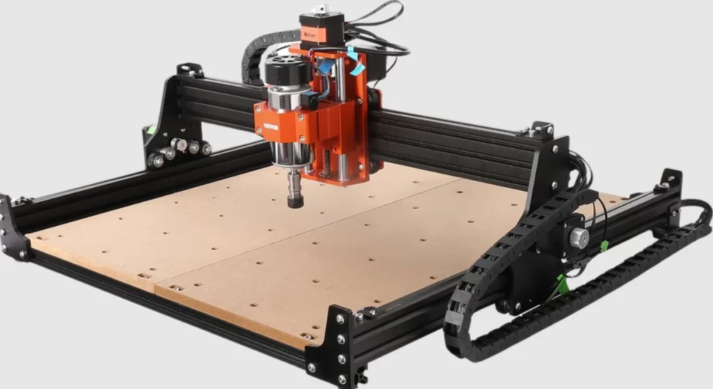 A CNC router with an orange spindle head 