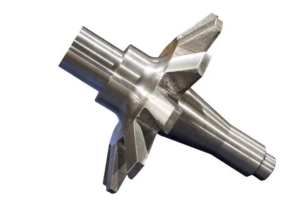 Precision-machined metal shaft with complex curved impeller blades, demonstrating CNC machining capabilities
