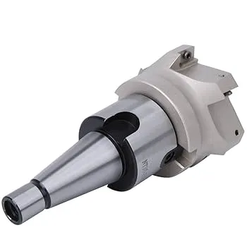 A close-up view of a face milling cutter with a white background 