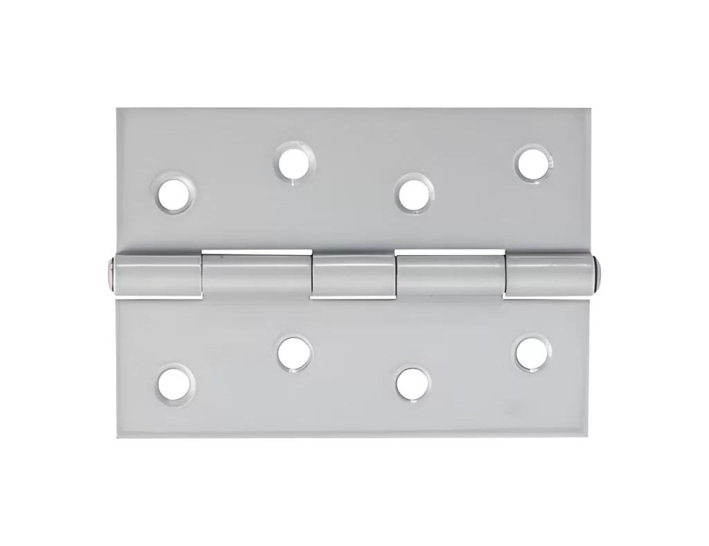 A metal hinge displayed on a plain surface.