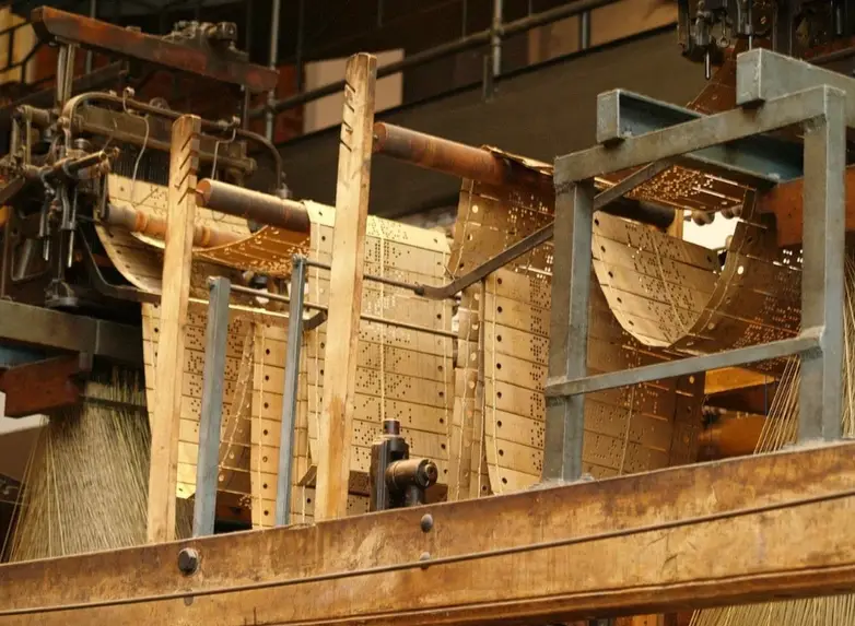 Vintage mechanical punched card programming system for early automated machinery 