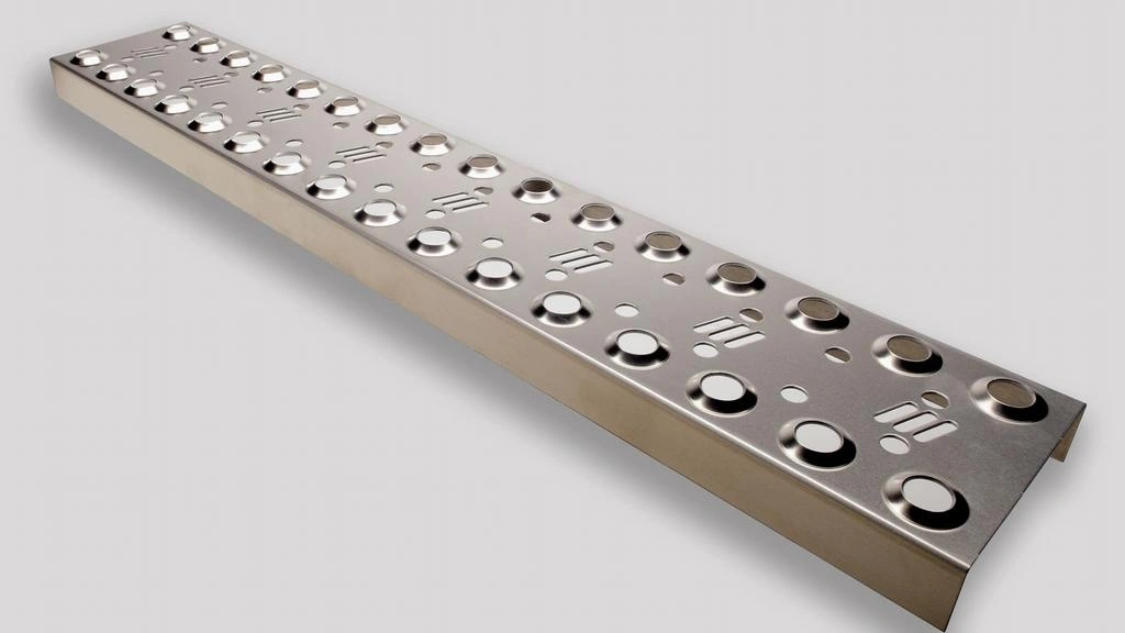 A sheet metal part with several punched holes