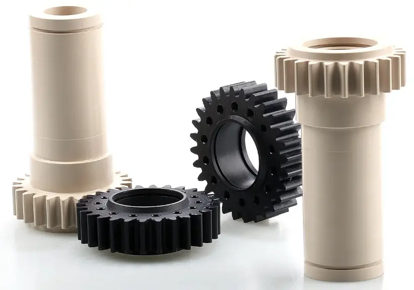 Black and white plastic gears from the injection molding process