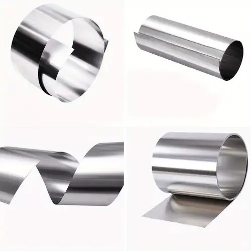 Various rolls of thin, shiny aluminum sheet metal.