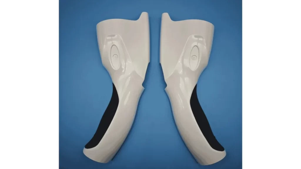 Product made with two-shot injection molding, displayed in a black and white color combination.